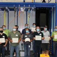 The students with their certificates of completion